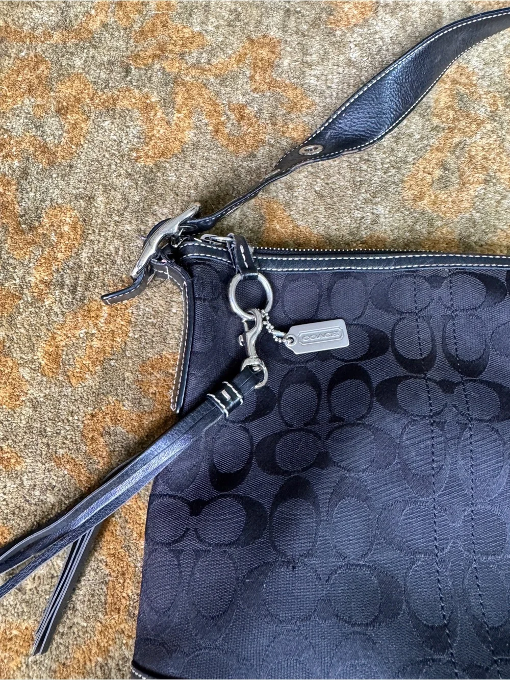 Coach Black Signature Crossbody with Tassel Charm